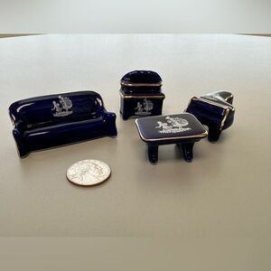 4 piece miniature porcelain figures